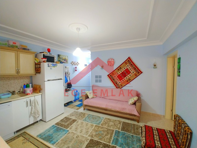 DİDİM'DE SATILIK 1+1 DAİRE, GENİŞ BALKON, MASRAFSIZ TEMİZ BİR EV