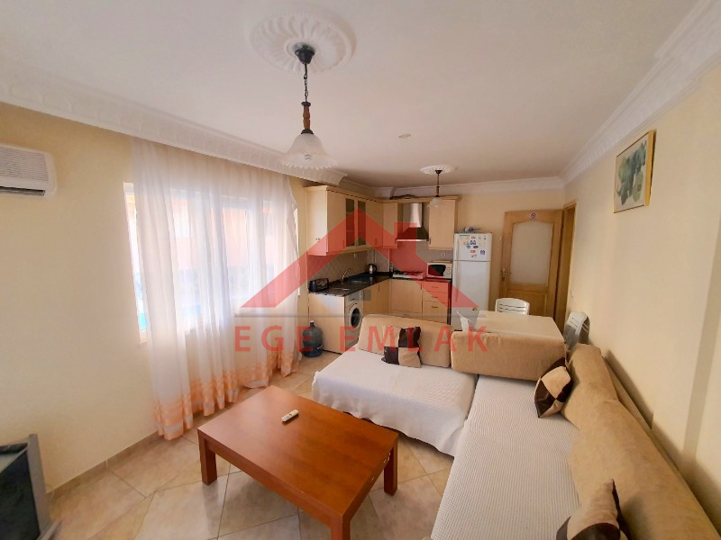 ALTINKUM'DA SATILIK YAZLIK DAİRE HAVUZLU SİTEDE EŞYALI 2+1