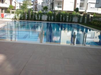 KONYAALTI HURMA MAHALLESİ AQUA HOMES SİTESİNDE EŞYALI KİRALIK 1+1 DAİRE