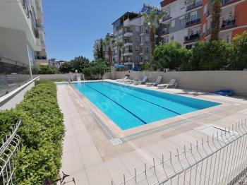 KONYAALTI HURMA MAHALLESİNDE EŞYALI KİRALIK 2+1 DAİRE
