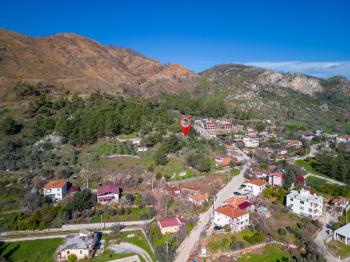 Marmaris Hisarönü Köy İçi İmarlı 2.214 m2 Deniz Manzaralı Arsa