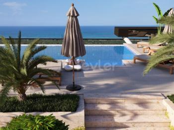 İskele Long Beach'de Satılık 2+1 Çatı Teraslı Daireler