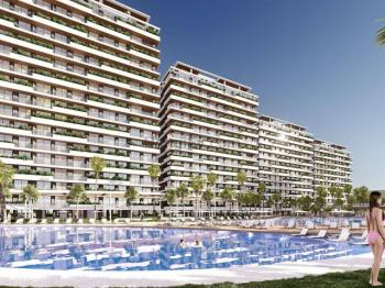 FIRSAT FİYATLI ! İskele Long Beach 'te Kapanmaz Deniz Manzaralı Bankasız Faizsiz Ödeme Planlı 1+1 Daire