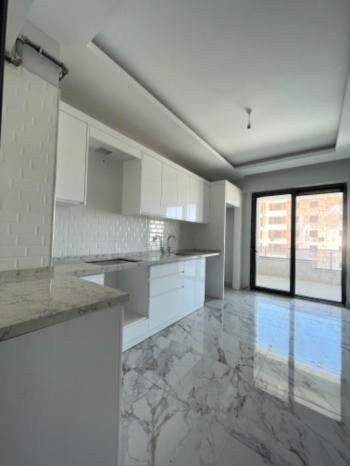 GÜVENAY - ÇORUM DR. İLHAN GÜREL CAD. KAHVELEN CİVARI SIFIR 3+1 DAİRE 