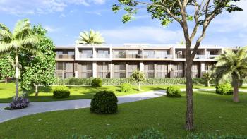 Kıbrıs İskele Long Beach Bölgesinde Site İçerisinde Satılık 1+1Bahçe katı ve Teras Daire