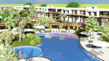 Kıbrıs İskele Long Beach Bölgesinde Site İçerisinde Satılık 1+1Bahçe katı ve Teras Daire