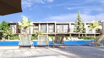 Kıbrıs İskele Long Beach Bölgesinde Site İçerisinde Satılık 1+1Bahçe katı ve Teras Daire