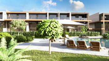 Kıbrıs İskele Long Beach Bölgesinde Site İçerisinde Satılık 1+1Bahçe katı ve Teras Daire