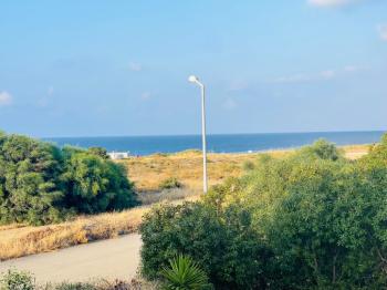 FIRSAT Kıbrıs Girne Lapta da Ful Kesilmez Deniz Manzaralı 2+1 Satılık Bahçe ve Üst Kat Daire