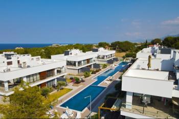 Kıbrıs Girne Alsancakta Milli Park'a ve Deniz Yakın Site İçerisinde Satılık 2+1 Bahçe Katı Daire