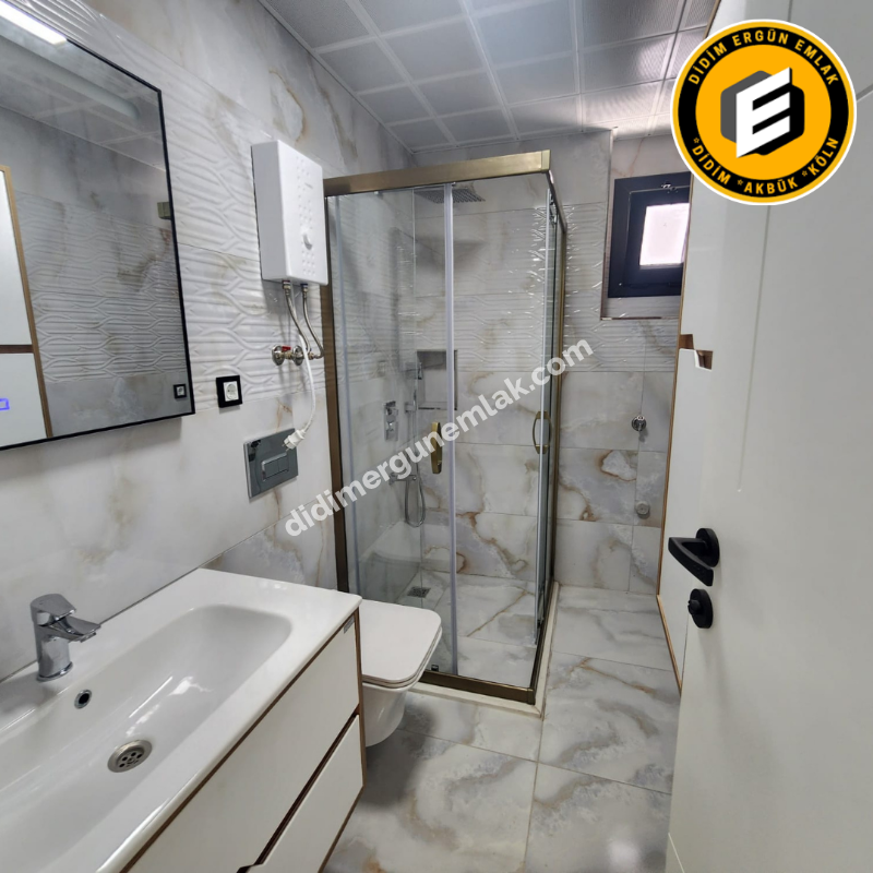 Didim Altınkum Mahallesin de Denize Yakın Ara Kat 3+1 Açık Mutfak Satılık Daire (1095 )