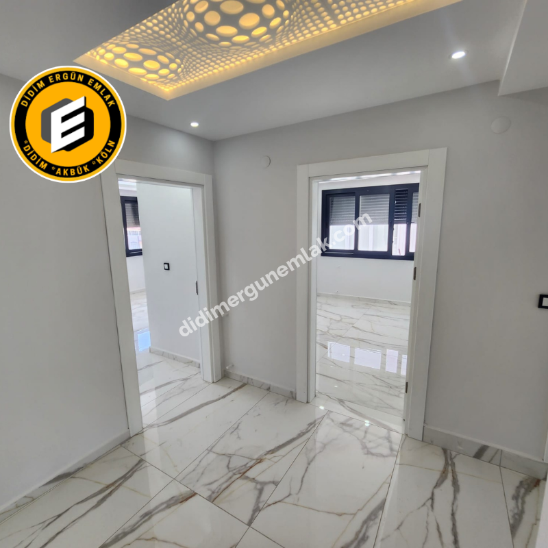Didim Altınkum Mahallesin de Denize Yakın Ara Kat 3+1 Açık Mutfak Satılık Daire (1095 )