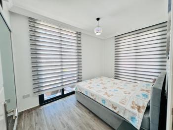 Kıbrıs Girne Lapta Bölgesinde Havuzlu Site İçinde Satılık 2+1 Ara Kat Daire