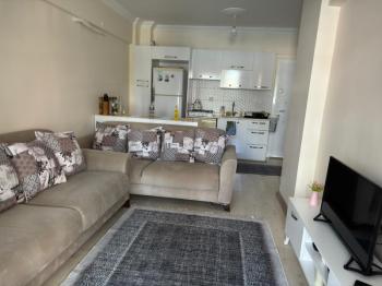 KUŞADASINDA HAVUZLU SİTEDE 1+1 DAİRE
