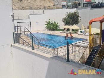 Havuzlu sitede masrafsız satılık daire