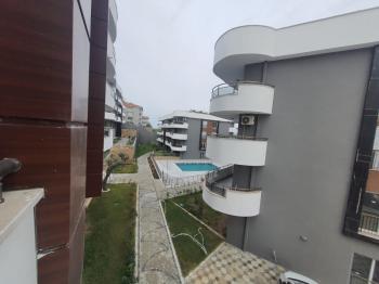 Havuzlu sitede yerden ısıtmalı 2+1 daire