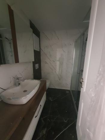 Havuzlu sitede yerden ısıtmalı 2+1 daire