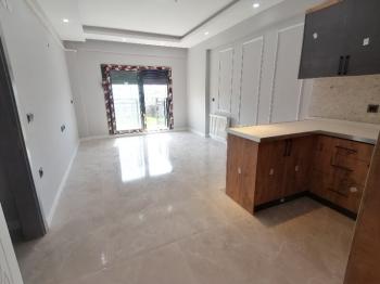KUŞADASI'NDA BAHÇESİ TAPUYA İŞLİ SIFIR DAİRE