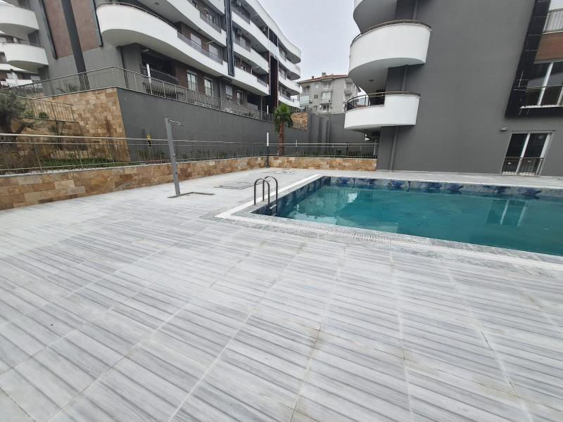 Havuzlu sitede yerden ısıtmalı 2+1 daire