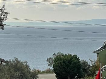 Burhaniye pelitköy sahilde satılık imarlı arsa