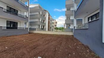 GÖLCÜK YAZLIK ILICA MEVKİ MERKEZİ KONUMDA SATILIK DAİRE