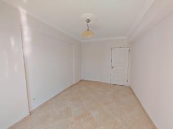 Didim Yeni Mahalle'de Geniş Balkonlu 1+1 Satılık Daire