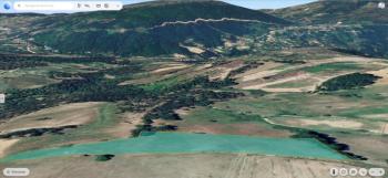 DijitalEmlak'tan Osmangazi Büyükdeliller köyünde Satılık 6.600 m2 Köye Yakın Manzaralı Tarla.