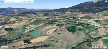 DijitalEmlak'tan Osmangazi Büyükdeliller köyünde Satılık 6.600 m2 Köye Yakın Manzaralı Tarla.