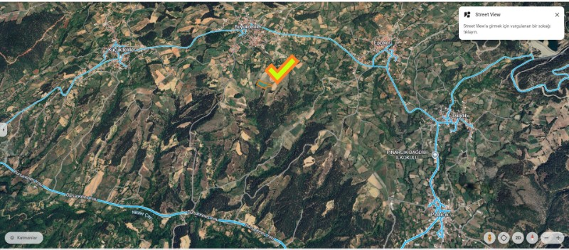 DijitalEmlak'tan Osmangazi Büyükdeliller köyünde Satılık 6.600 m2 Köye Yakın Manzaralı Tarla.