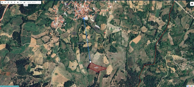 DijitalEmlak'tan Osmangazi Büyükdeliller köyünde Satılık 6.600 m2 Köye Yakın Manzaralı Tarla.