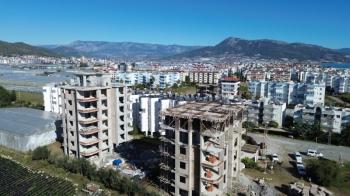 GÜZELYURT DENİZ MANZARALI 3+1 TEMELDEN DAİRELER