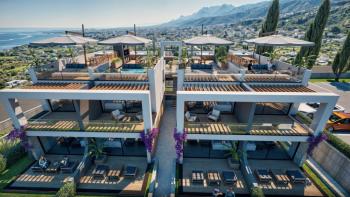 Kıbrıs Girne Lapta da Ful Deniz Manzaralı  2+1 Bahçe ve Üst Kat Daireler