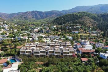 Kıbrıs Girne Lapta da Ful Deniz Manzaralı Tüm Beyaz Eşyalar ve Klimalar Dahil  1+1 Bahçe Katı Daireler