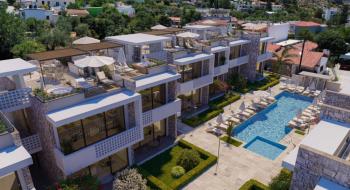 Kıbrıs Girne Lapta da Ful Deniz Manzaralı Tüm Beyaz Eşyalar ve Klimalar Dahil  1+1 Bahçe Katı Daireler