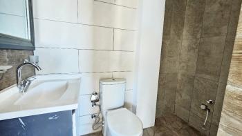 Karşıyaka bölgesinde, Deniz manzarali, Çatı teraslı, kiralık 3+1 Daire