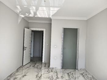Ayvalık Güzelbahçe Evlerinde, Satılık, Lüks, Deniz Manzaralı ,1+1 Sıfır Daire.