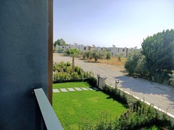 Ayvalık Güzelbahçe Evlerinde, Satılık, Lüks, Deniz Manzaralı ,1+1 Sıfır Daire.
