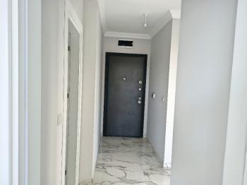 Ayvalık Güzelbahçe Evlerinde, Deniz Manzaralı, 2+1 Satılık Sıfır Lüks Daire.