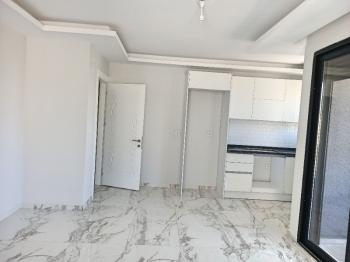 Ayvalık Güzelbahçe Evlerinde, Deniz Manzaralı, 2+1 Satılık Sıfır Lüks Daire.