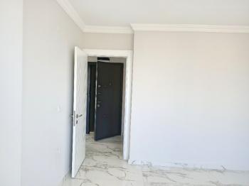 Ayvalık Güzelbahçe Evlerinde, Deniz Manzaralı, 2+1 Satılık Sıfır Lüks Daire.