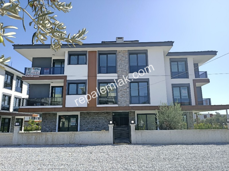 Ayvalık Güzelbahçe Evlerinde, Satılık, Lüks, Deniz Manzaralı ,1+1 Sıfır Daire.