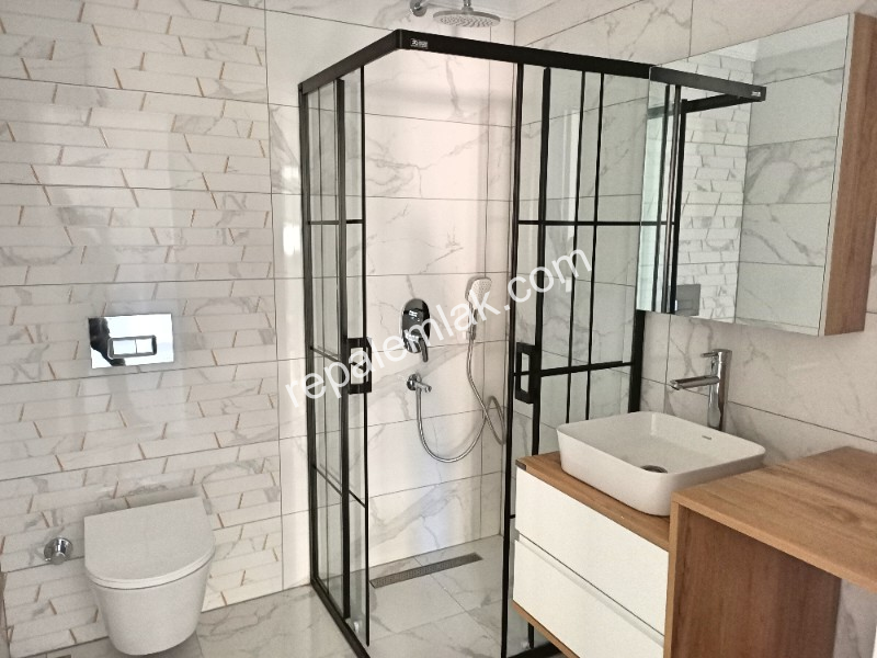 Ayvalık Güzelbahçe Evlerinde, Satılık, Lüks, Deniz Manzaralı ,1+1 Sıfır Daire.