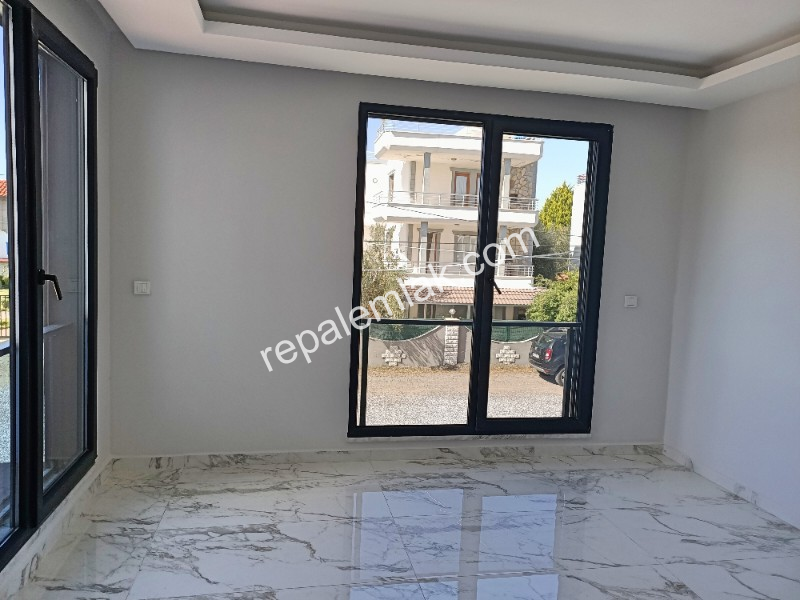 Ayvalık Güzelbahçe Evlerinde, Satılık, Lüks, Deniz Manzaralı ,1+1 Sıfır Daire.