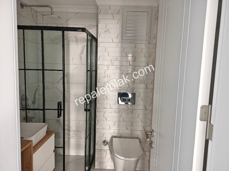 Ayvalık Güzelbahçe Evlerinde, Deniz Manzaralı, 2+1 Satılık Sıfır Lüks Daire.