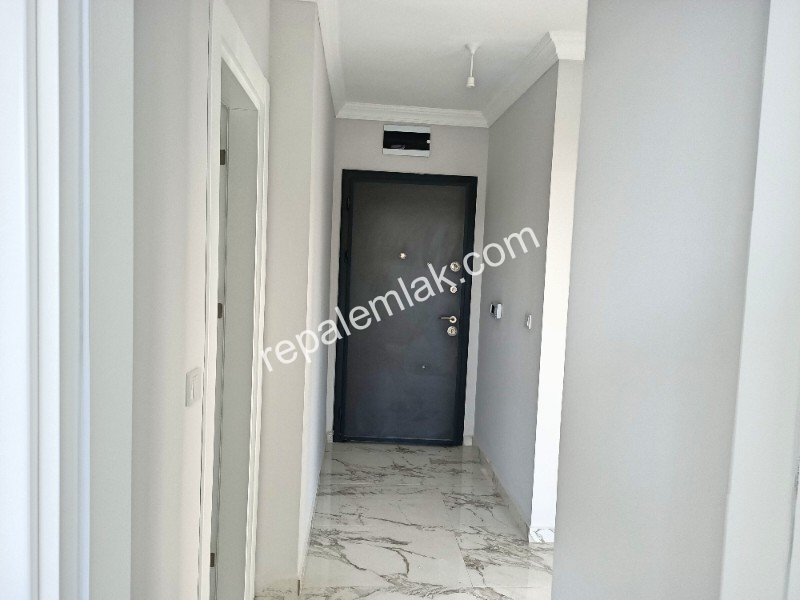 Ayvalık Güzelbahçe Evlerinde, Deniz Manzaralı, 2+1 Satılık Sıfır Lüks Daire.