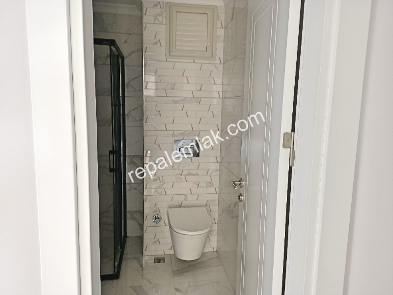Ayvalık Güzelbahçe Evlerinde, Deniz Manzaralı, 2+1 Satılık Sıfır Lüks Daire.