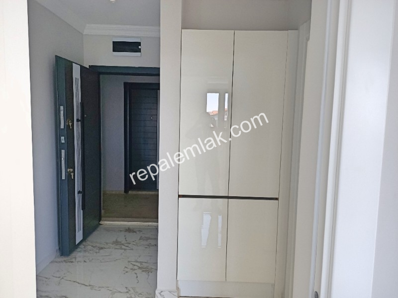 Ayvalık Güzelbahçe Evlerinde, Deniz Manzaralı, 2+1 Satılık Sıfır Lüks Daire.