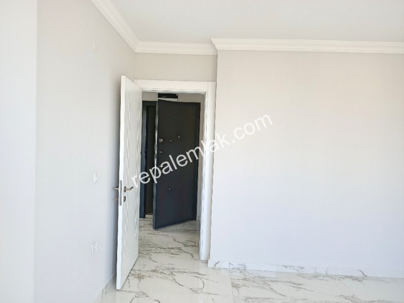 Ayvalık Güzelbahçe Evlerinde, Deniz Manzaralı, 2+1 Satılık Sıfır Lüks Daire.