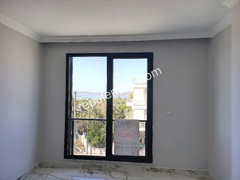 Ayvalık Güzelbahçe Evlerinde, Deniz Manzaralı, 2+1 Satılık Sıfır Lüks Daire.