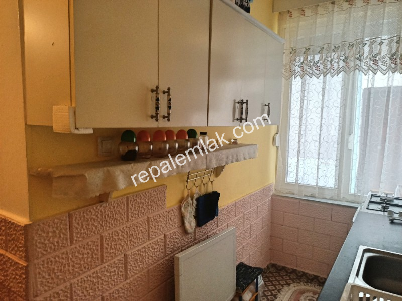 Ayvalık Sarımsaklı' da, Denize Sıfır 1+1 Satılık Daire.